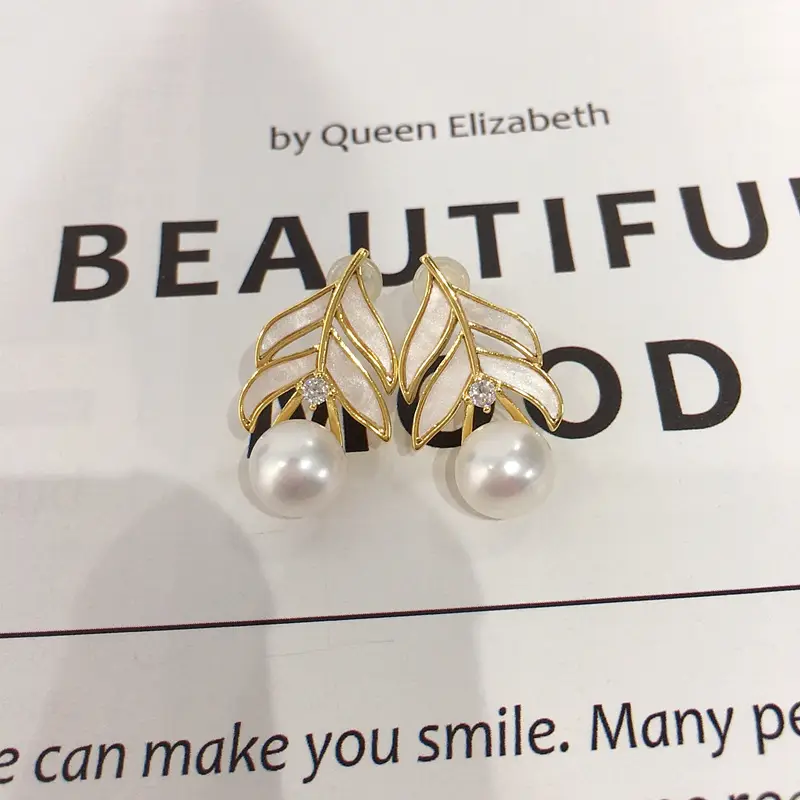 18K Gold Pearl Feather Earrings for Women — feature 6