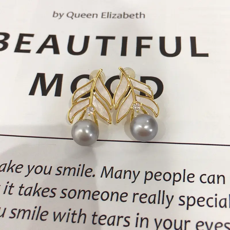 18K Gold Pearl Feather Earrings for Women — feature 8