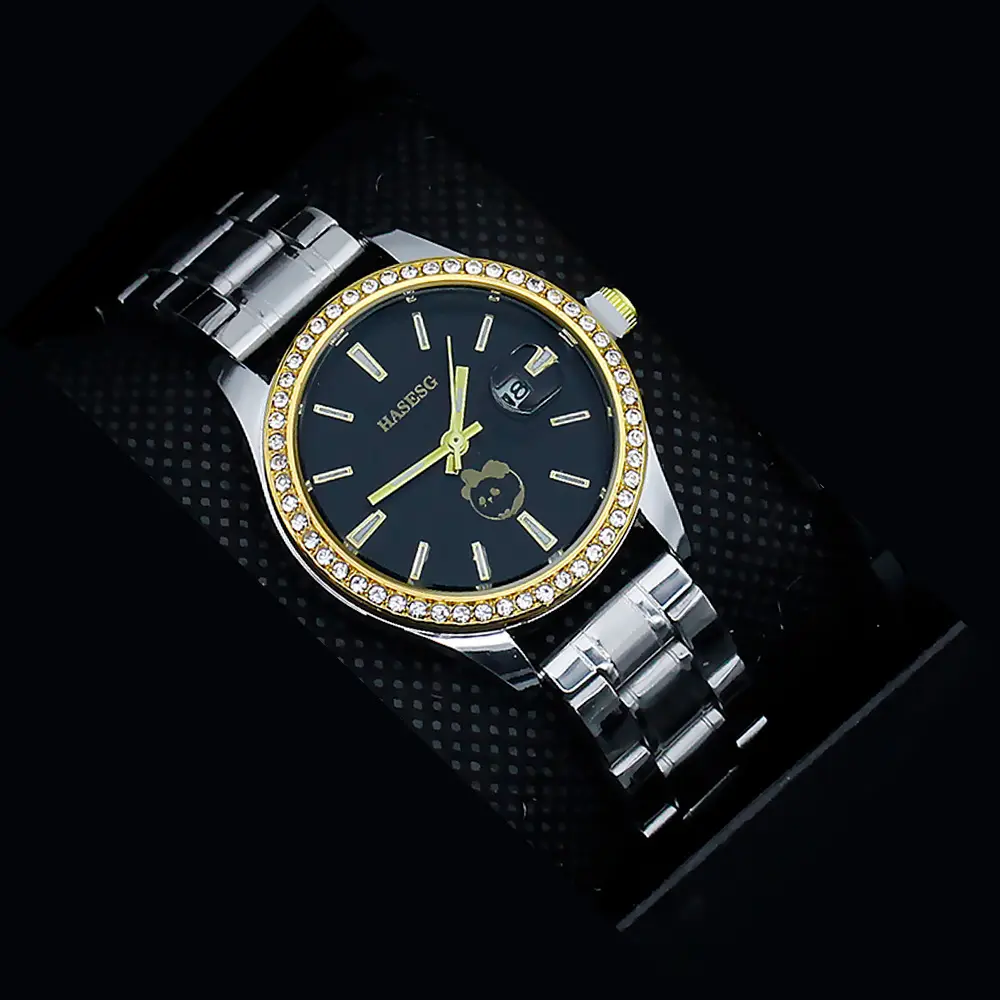 Women's Gold Quartz Watch with Diamond Band — feature 13
