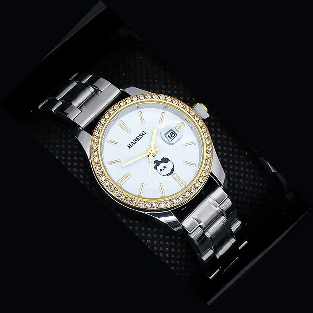 Women's Gold Quartz Watch with Diamond Band — feature 16