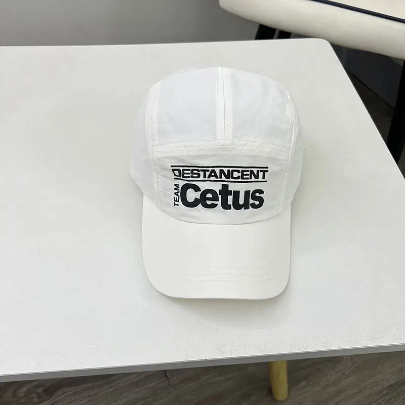 Green Cotton Cap with "Destinant Cetus" Design