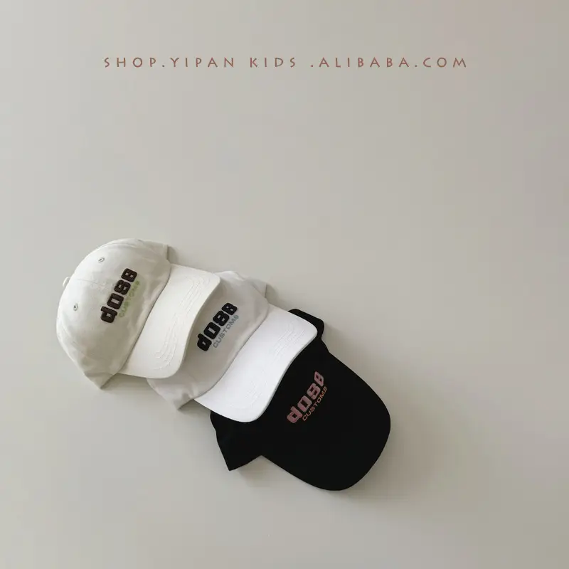 White Embroidered Baby Cap with "Yipan" Logo - Image 4