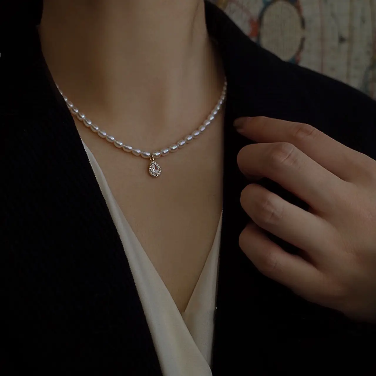 Women's Pearl Collarbone Necklace with Red Sweater — feature 8