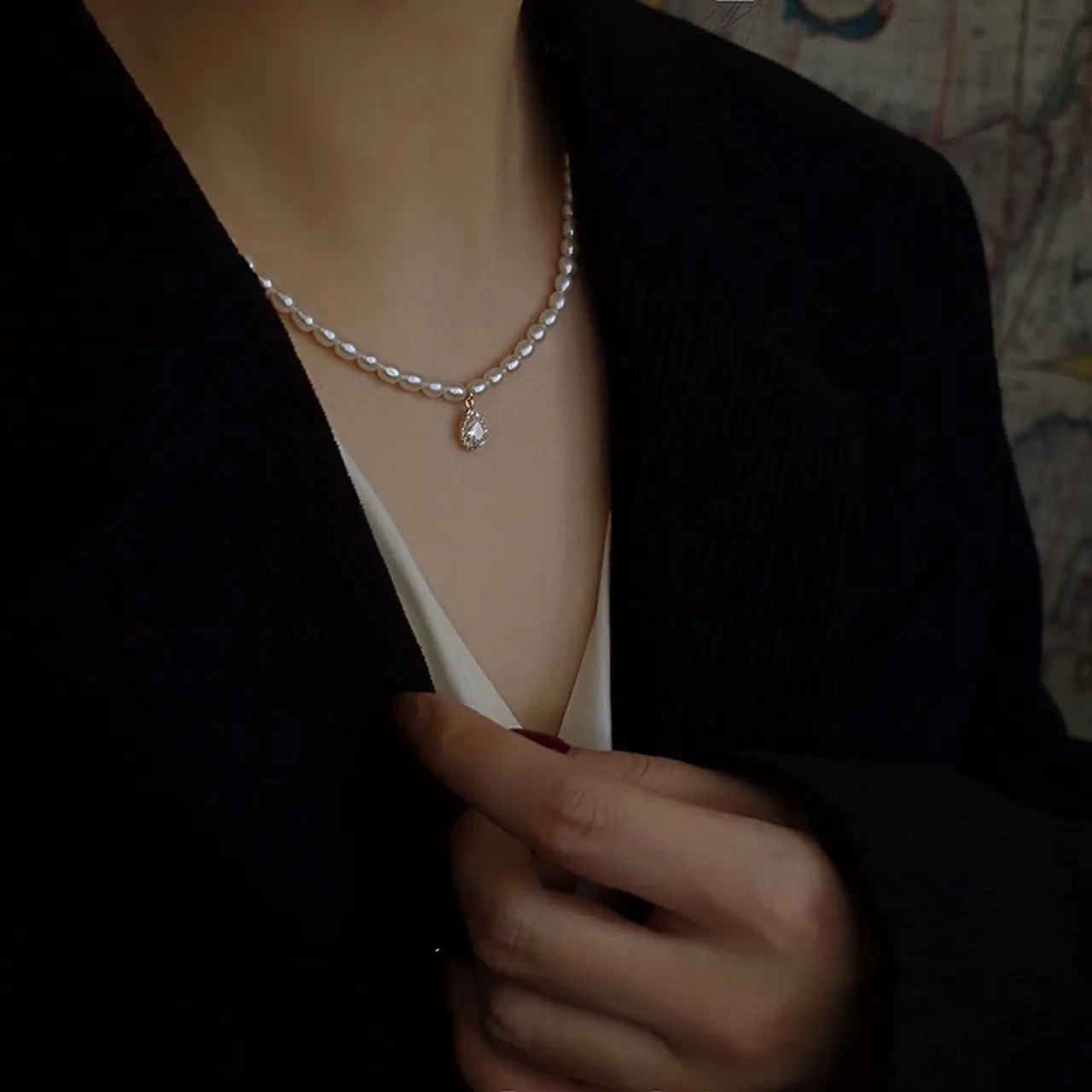Women's Pearl Collarbone Necklace with Red Sweater — feature 9