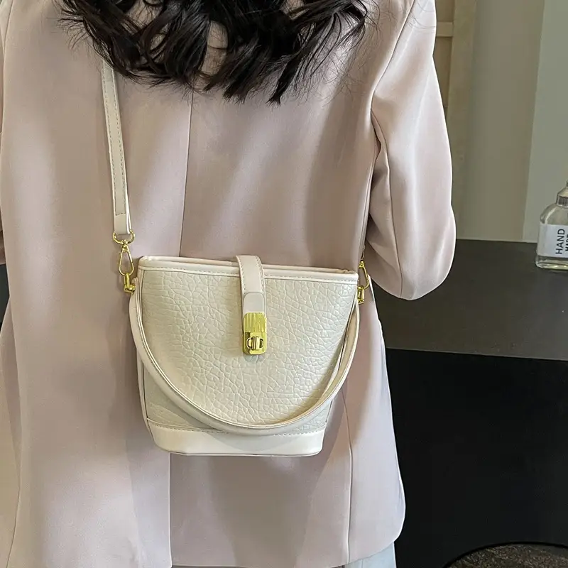 Pink Leather Bucket Bag for Women with Gold Clasp - Image 8