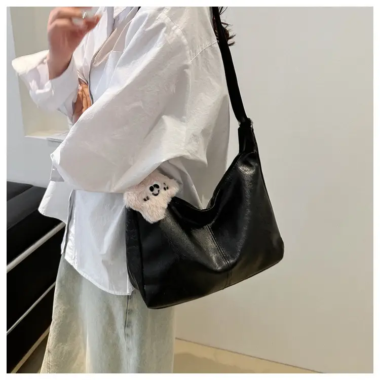 Women's Soft Leather Crossbody Bag with Cute Pom Pom Design — feature 14