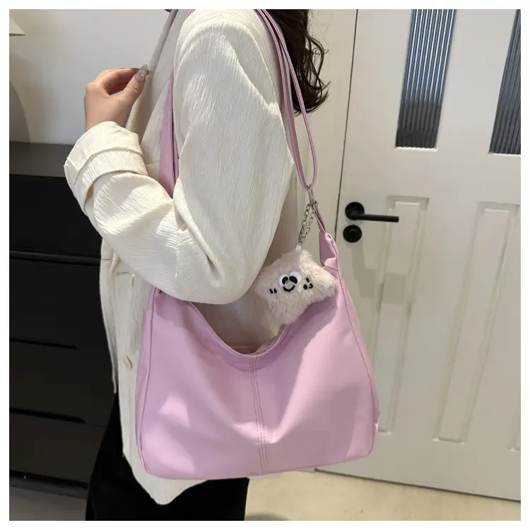 Women's Soft Leather Crossbody Bag with Cute Pom Pom Design — feature 17