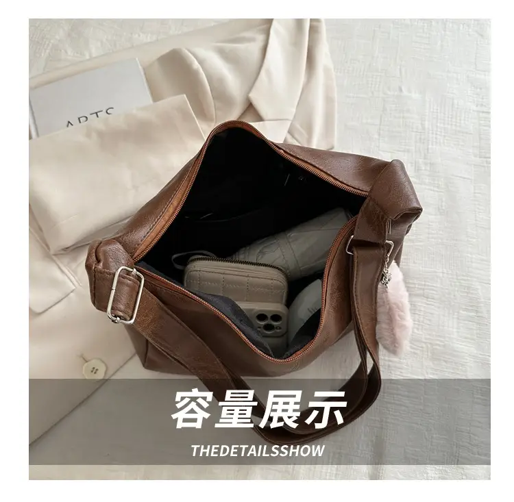 Women's Soft Leather Crossbody Bag with Cute Pom Pom Design — feature 6