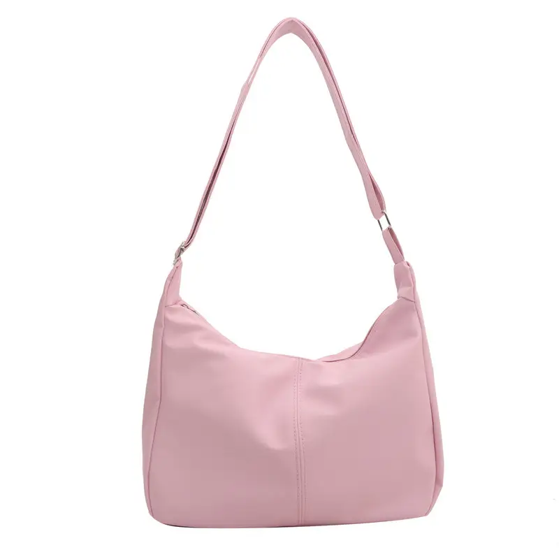 Women's Soft Leather Crossbody Bag with Cute Pom Pom Design