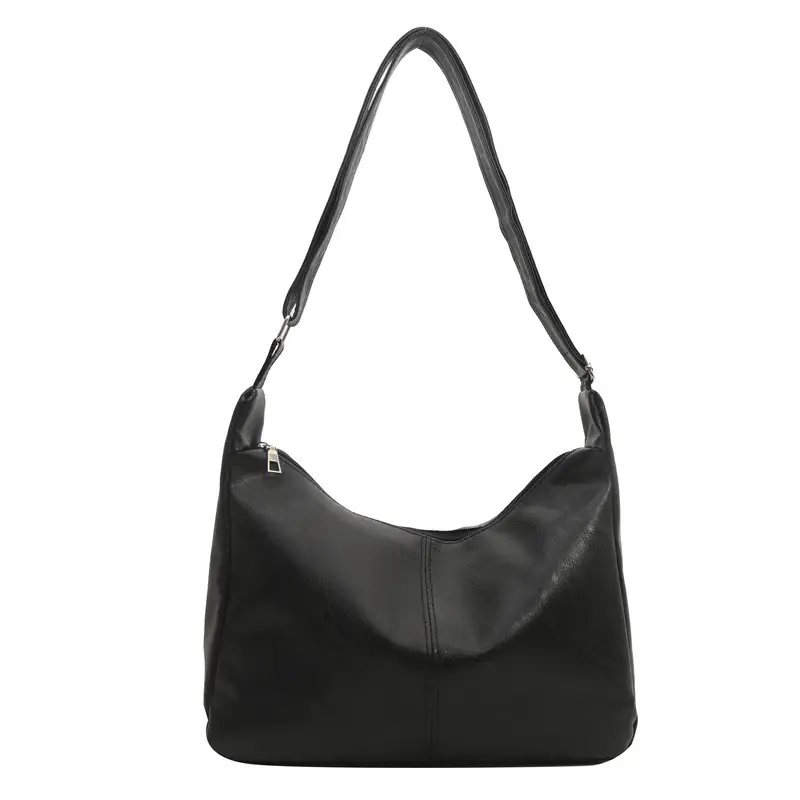 Women's Soft Leather Crossbody Bag with Cute Pom Pom Design