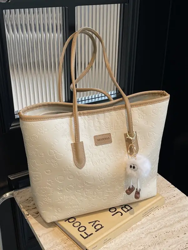 Women's Black Embossed Tote Bag with Cute Charm
