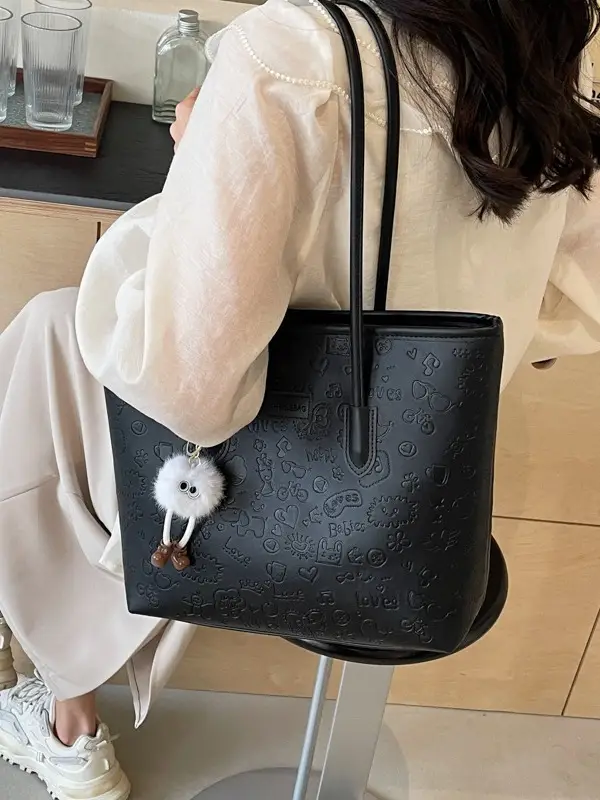 Women's Black Embossed Tote Bag with Cute Charm