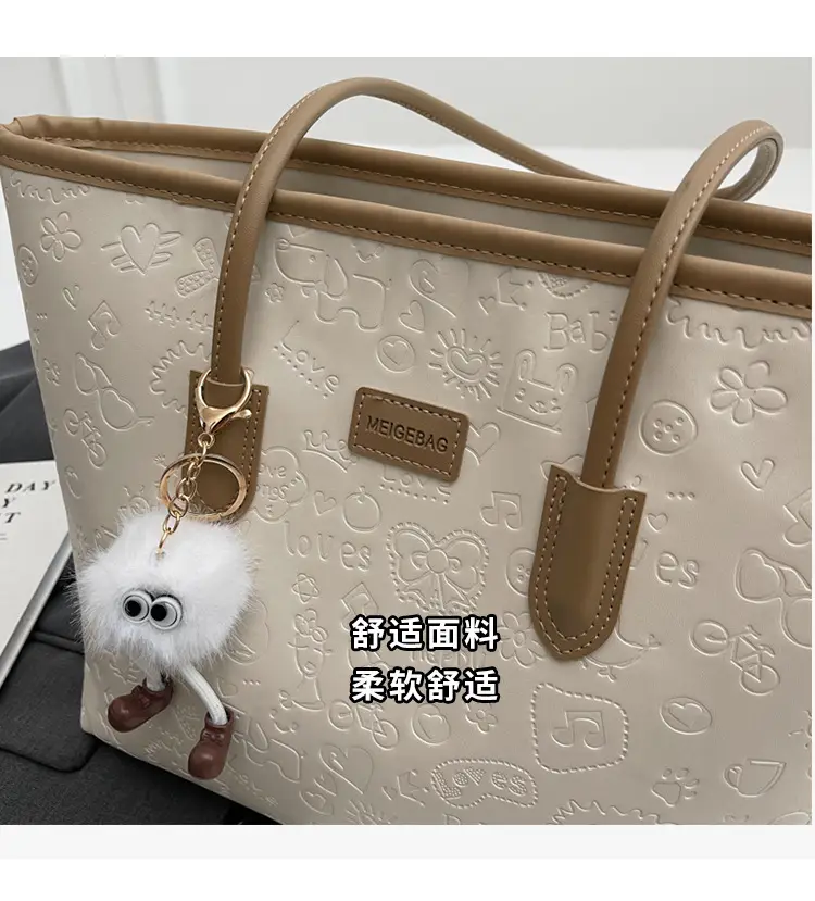 Women's Black Embossed Tote Bag with Cute Charm — feature 14