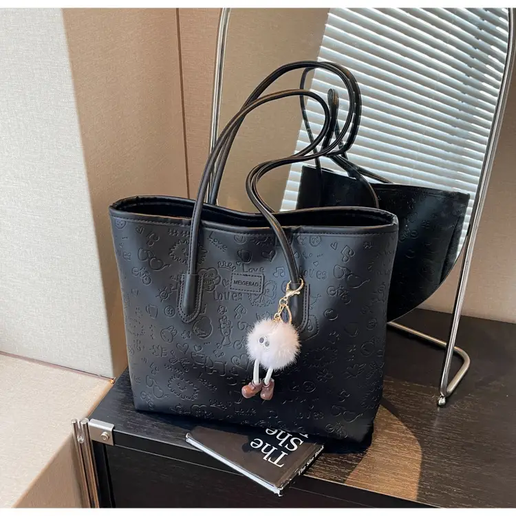 Women's Black Embossed Tote Bag with Cute Charm — feature 23