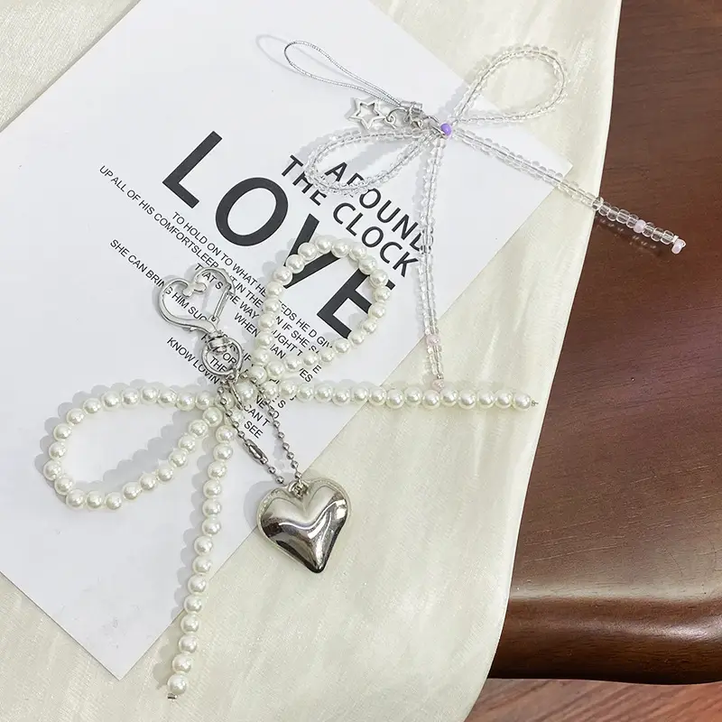 Heart Shaped Pearl Pendant with Love Bow Keychain — feature 1