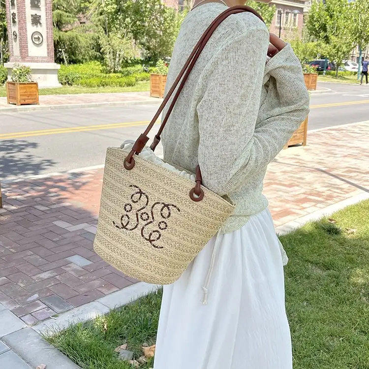 Women Woven Straw Crossbody Bag with Monogram Design - Image 5