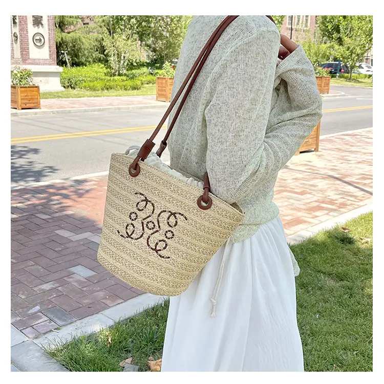 Women Woven Straw Crossbody Bag with Monogram Design — feature 15