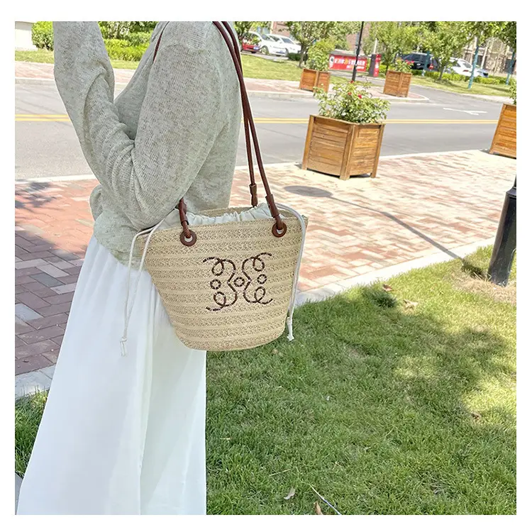 Women Woven Straw Crossbody Bag with Monogram Design — feature 16