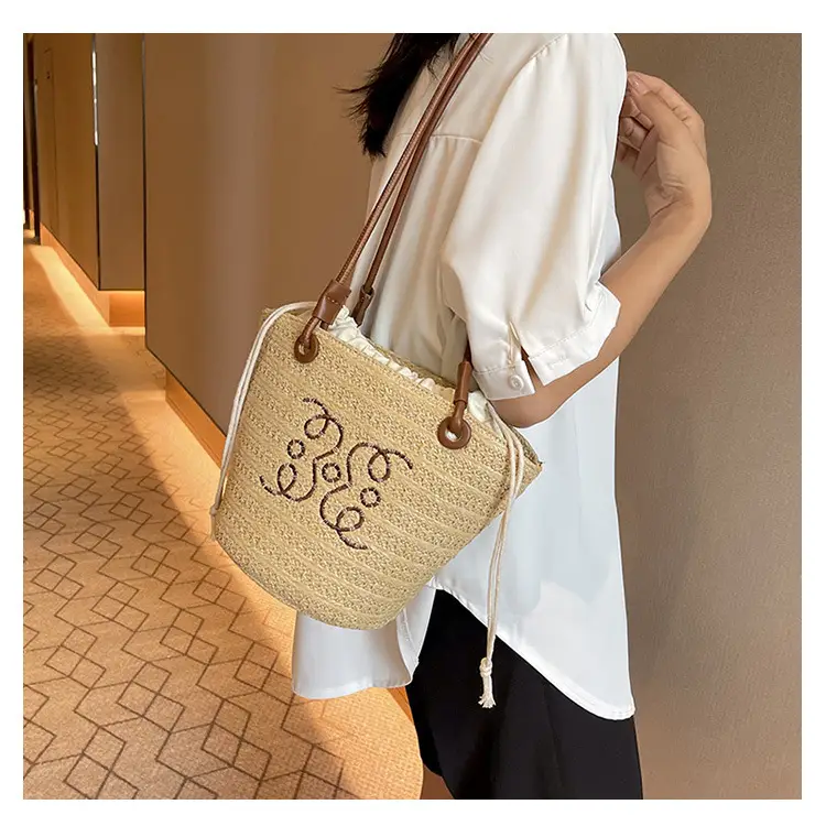Women Woven Straw Crossbody Bag with Monogram Design — feature 18