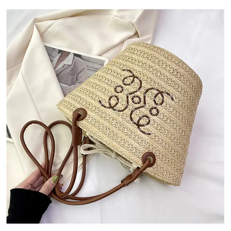 Women Woven Straw Crossbody Bag with Monogram Design — feature 20