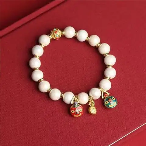 Golden Buddha Bead Bracelet for Women with Gold Swallow Design — feature 4