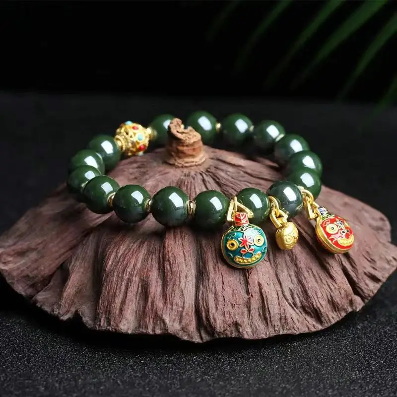 Golden Buddha Bead Bracelet for Women with Gold Swallow Design
