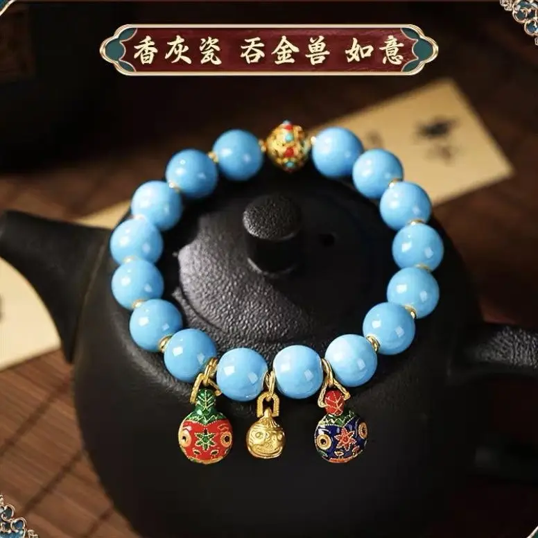 Golden Buddha Bead Bracelet for Women with Gold Swallow Design