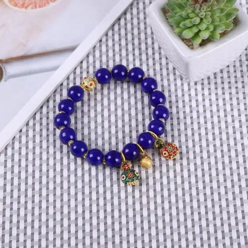 Golden Buddha Bead Bracelet for Women with Gold Swallow Design