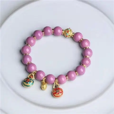 Golden Buddha Bead Bracelet for Women with Gold Swallow Design