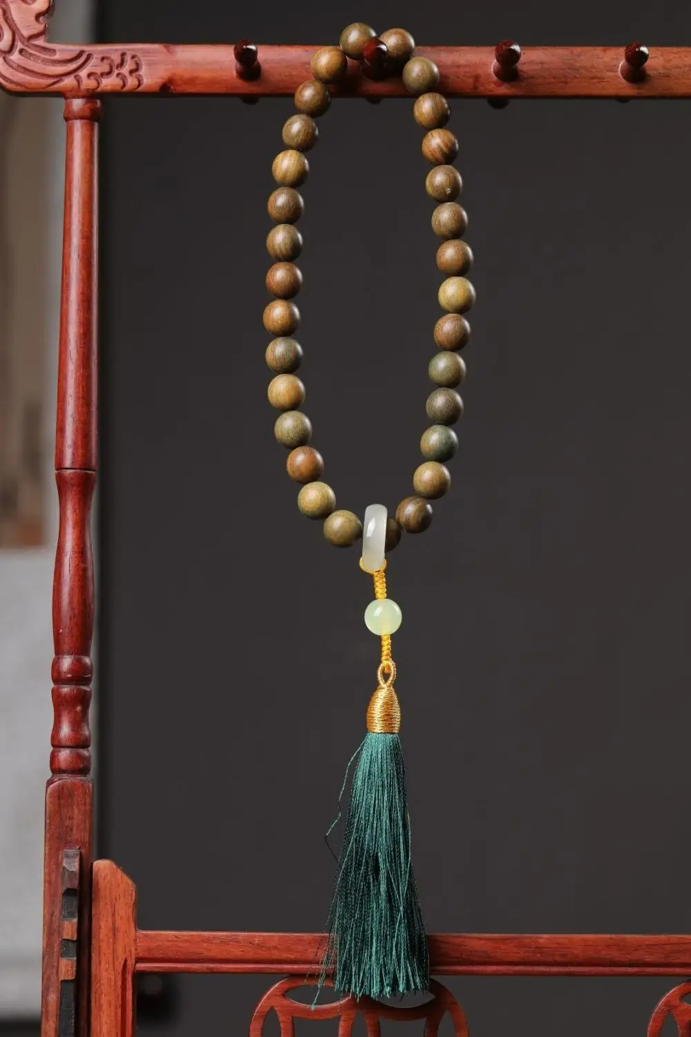 Argentinian Green Sandalwood Bracelet with Buddha Tassel — feature 11