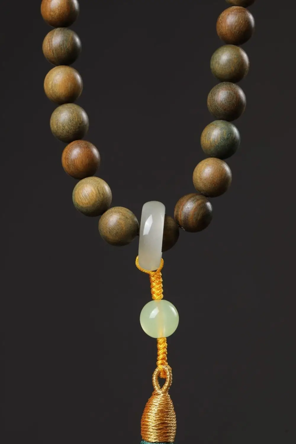 Argentinian Green Sandalwood Bracelet with Buddha Tassel — feature 12