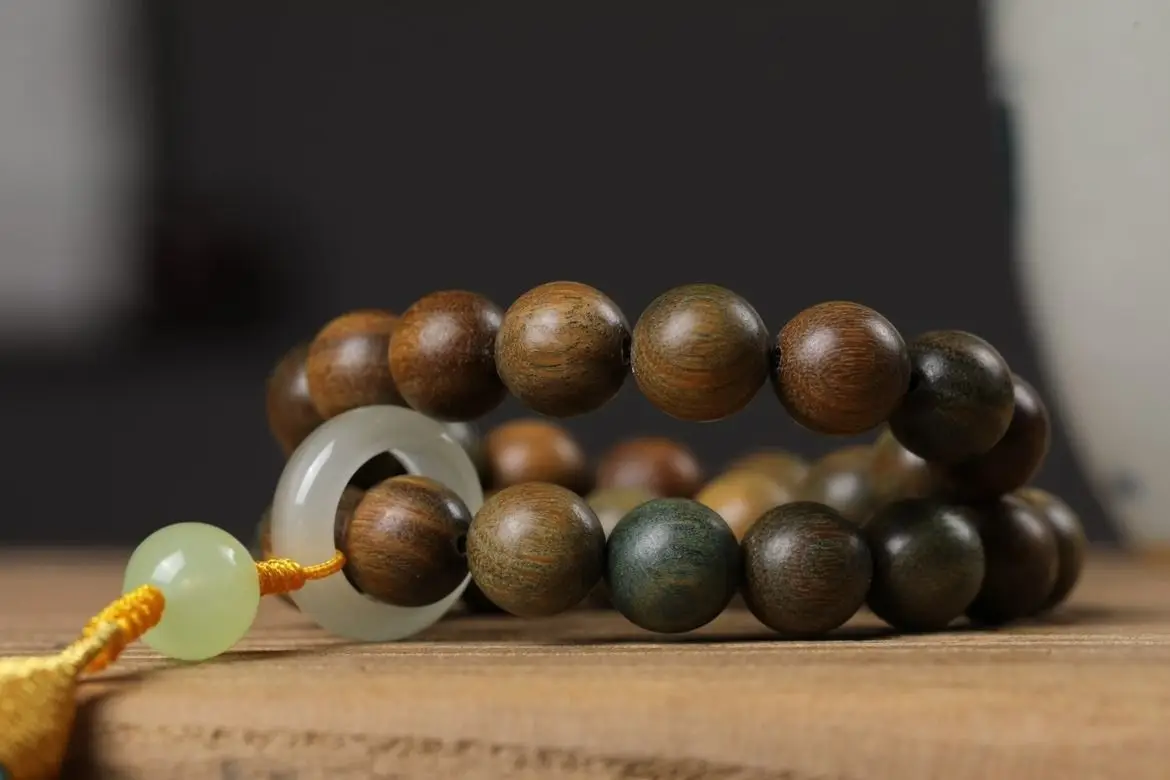 Argentinian Green Sandalwood Bracelet with Buddha Tassel — feature 13