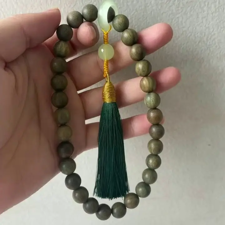 Argentinian Green Sandalwood Bracelet with Buddha Tassel — feature 16