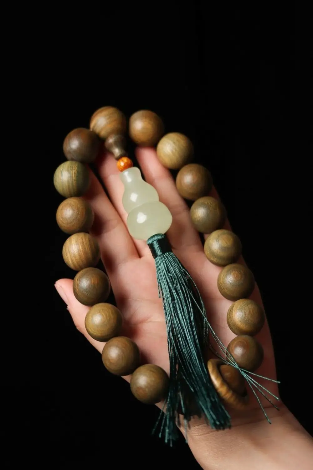 Argentinian Green Sandalwood Bracelet with Buddha Tassel — feature 18
