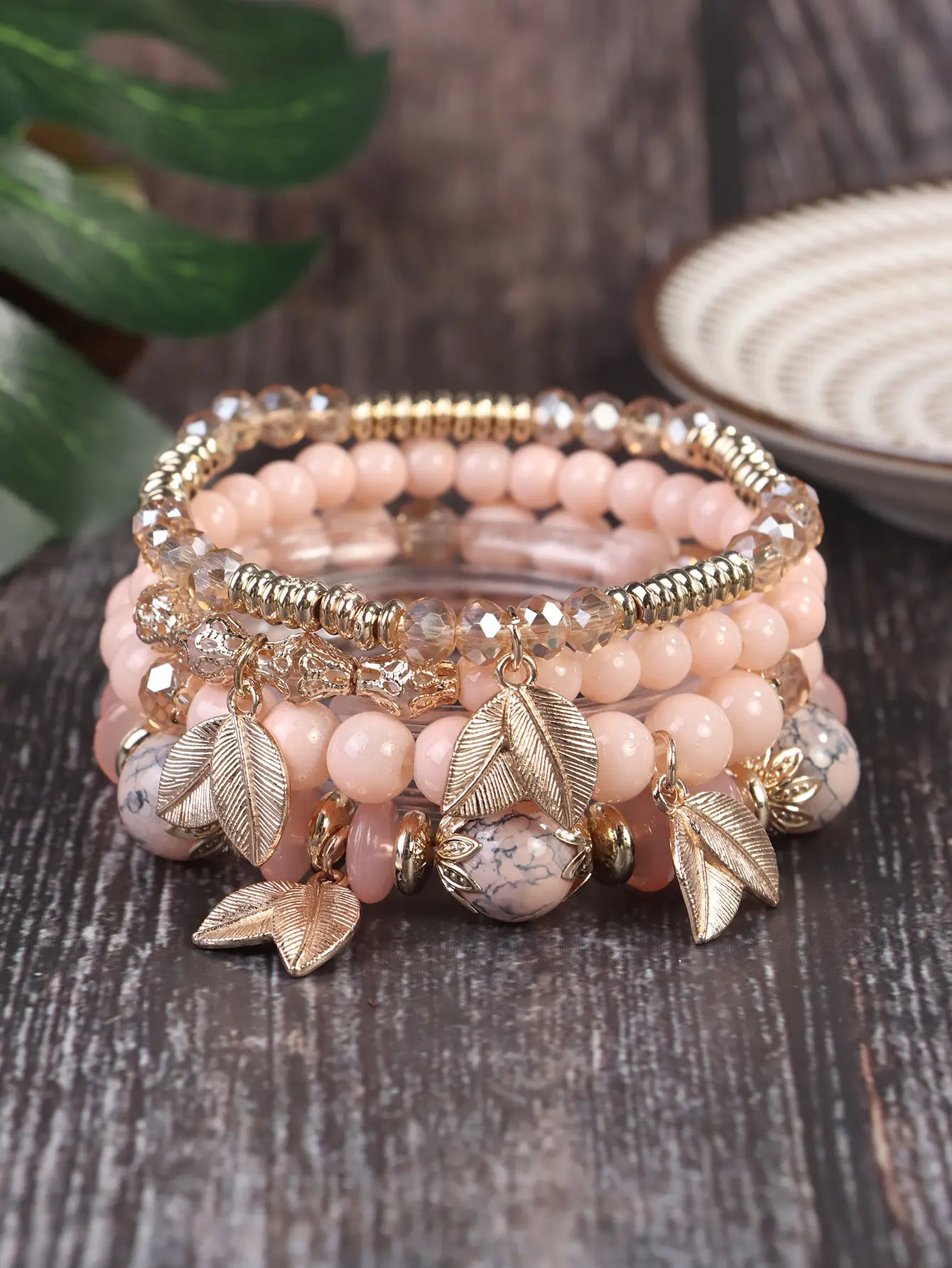 Pink Beaded Multi Layer Bracelet with Gold Leaf Pendants — feature 2