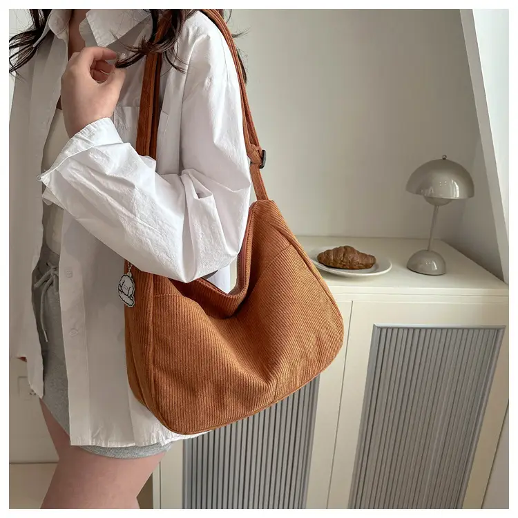 Black Knitted Shoulder Crossbody Bag with Charm — feature 11