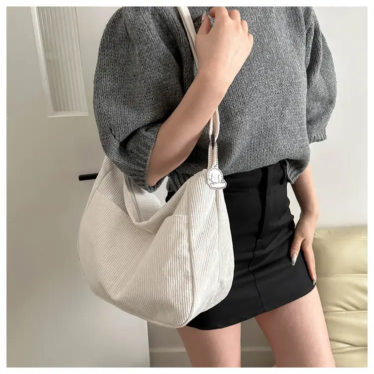 Black Knitted Shoulder Crossbody Bag with Charm — feature 19