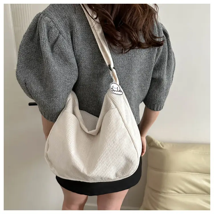 Black Knitted Shoulder Crossbody Bag with Charm — feature 20