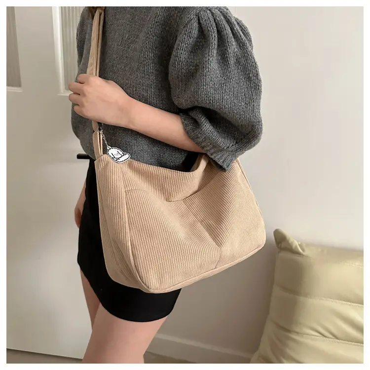 Black Knitted Shoulder Crossbody Bag with Charm — feature 21
