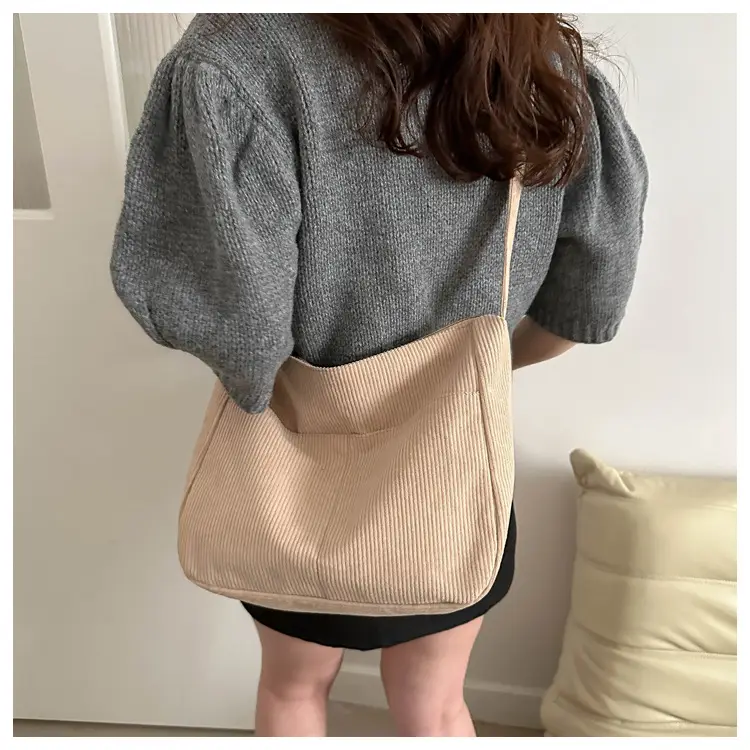 Black Knitted Shoulder Crossbody Bag with Charm — feature 22