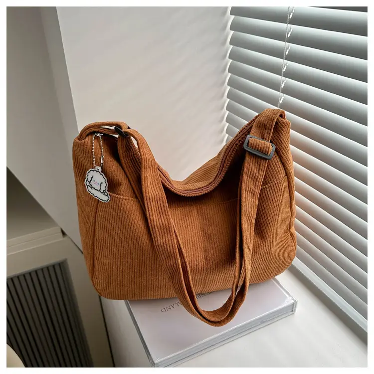Black Knitted Shoulder Crossbody Bag with Charm — feature 28