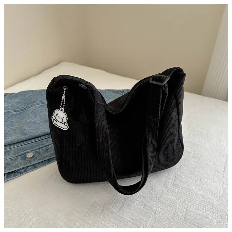 Black Knitted Shoulder Crossbody Bag with Charm — feature 31