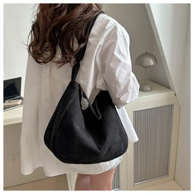 Black Knitted Shoulder Crossbody Bag with Charm — feature 9