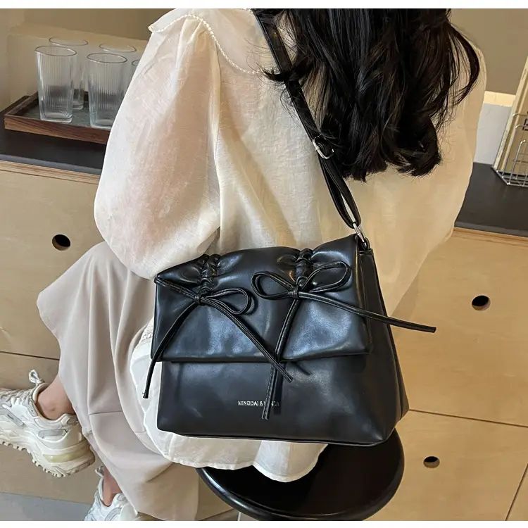 Women's Silver Bow Crossbody Bag 2026 — feature 24