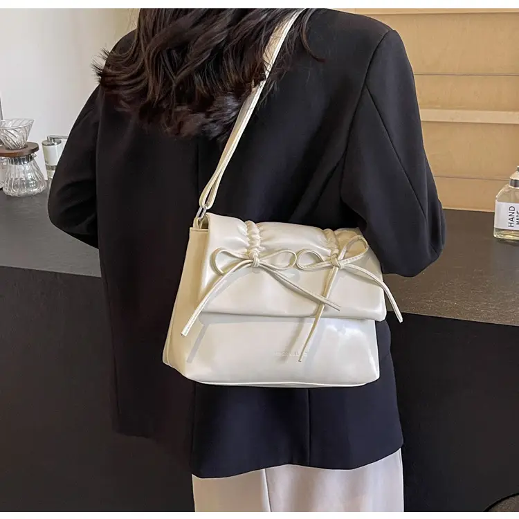 Women's Silver Bow Crossbody Bag 2026 — feature 26