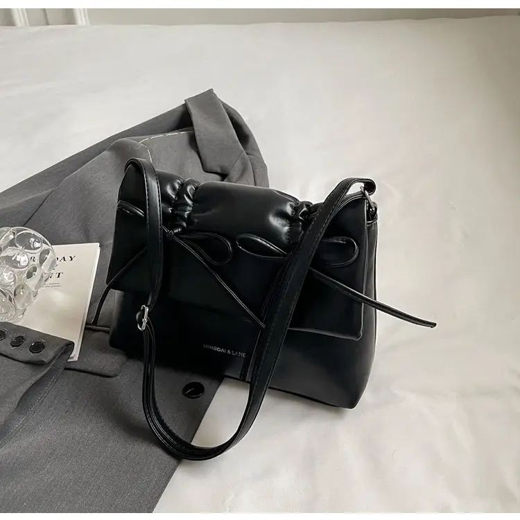 Women's Silver Bow Crossbody Bag 2026 — feature 35