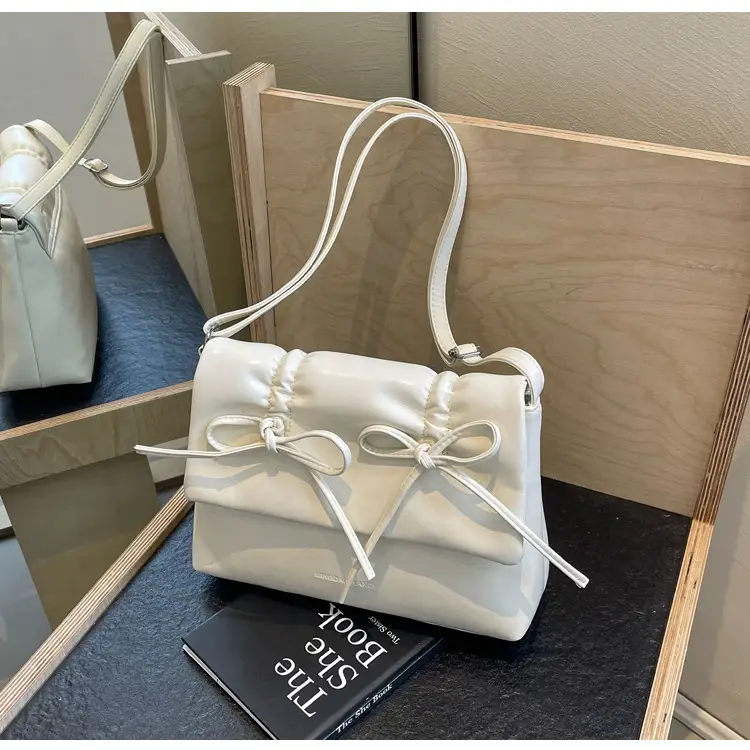 Women's Silver Bow Crossbody Bag 2026 — feature 38