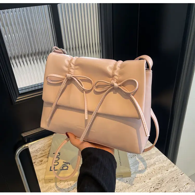 Women's Silver Bow Crossbody Bag 2026 — feature 40