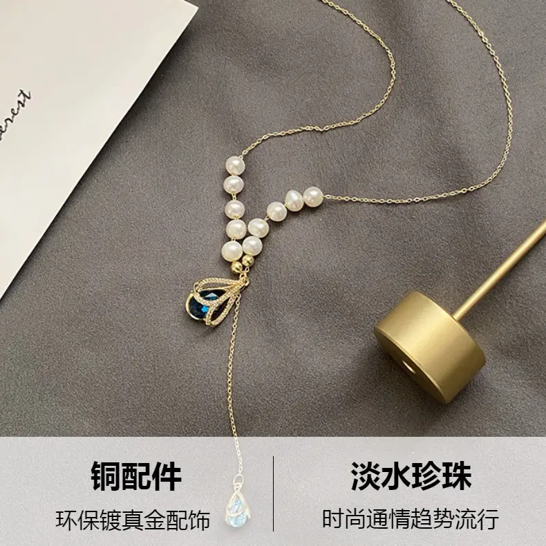 Women's Pearl Necklace with Blue Crystal Pendant — feature 1