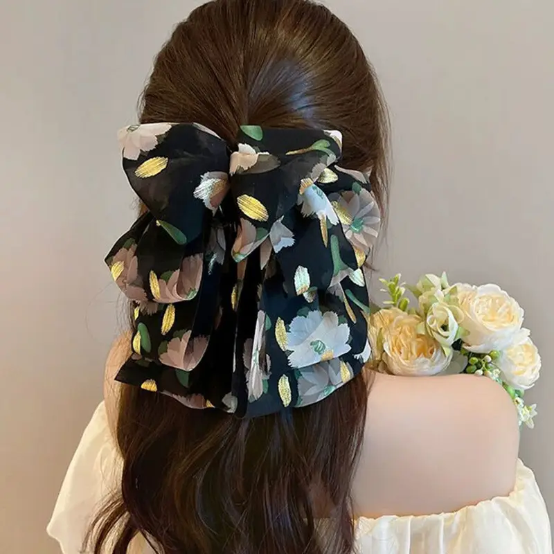Yellow and green floral ribbon grip clip